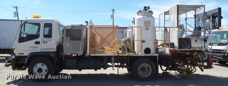 image for item DD1125 1997 GMC T6500 road striper truck