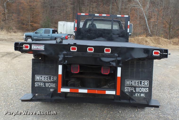 image for item DD2406 1990 Ford FT900 flatbed truck