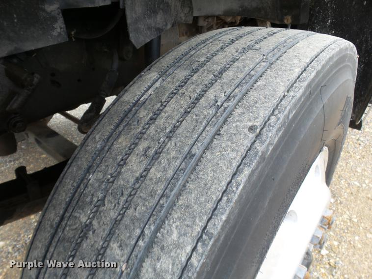 image for item DD2406 1990 Ford FT900 flatbed truck