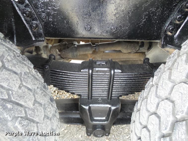 image for item DD2406 1990 Ford FT900 flatbed truck