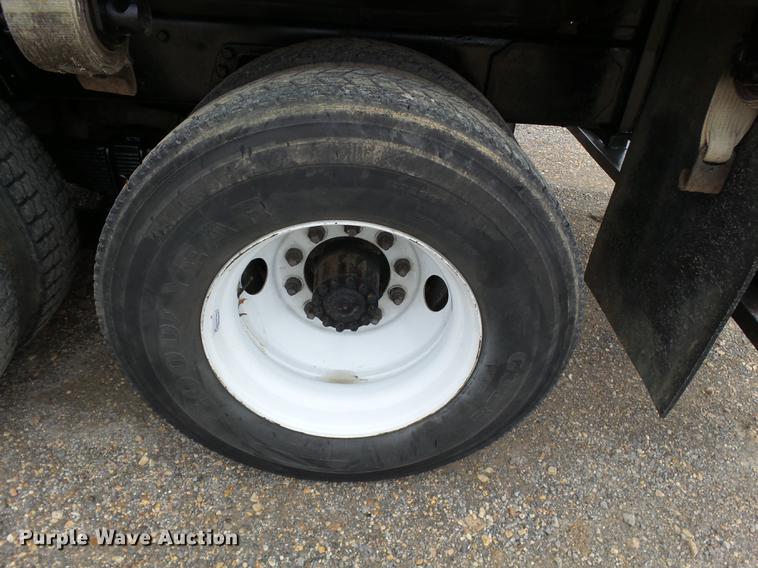 image for item DD2406 1990 Ford FT900 flatbed truck