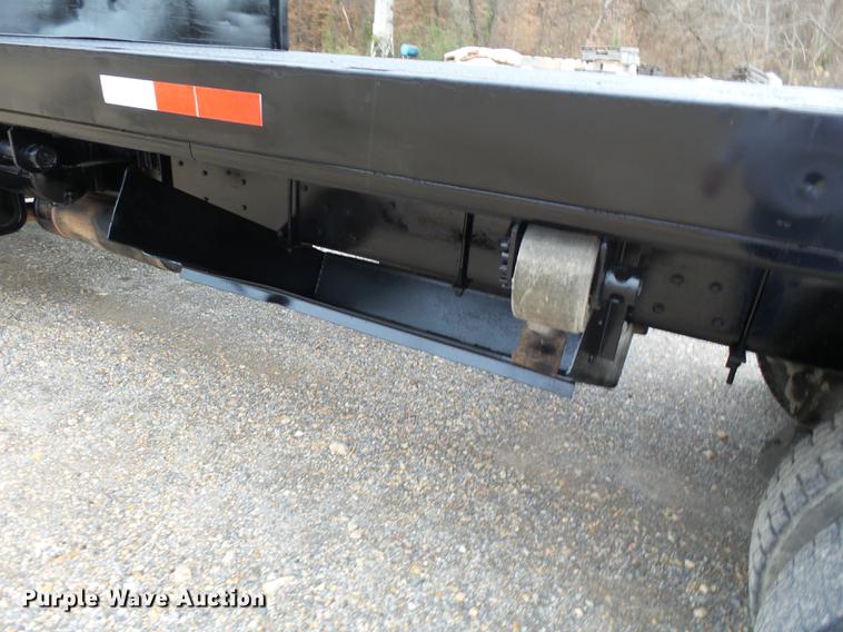 image for item DD2406 1990 Ford FT900 flatbed truck