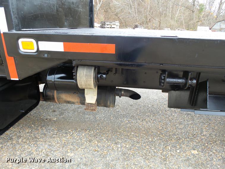 image for item DD2406 1990 Ford FT900 flatbed truck