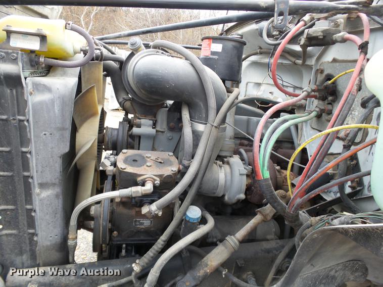 image for item DD2406 1990 Ford FT900 flatbed truck