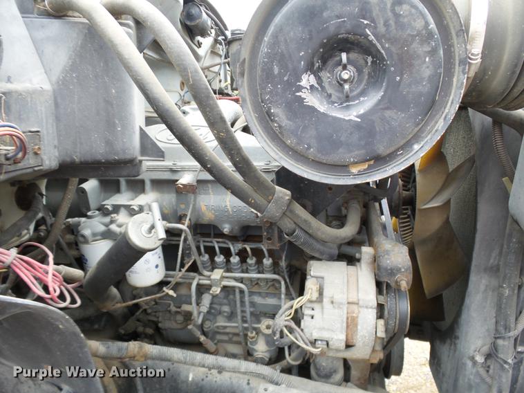 image for item DD2406 1990 Ford FT900 flatbed truck