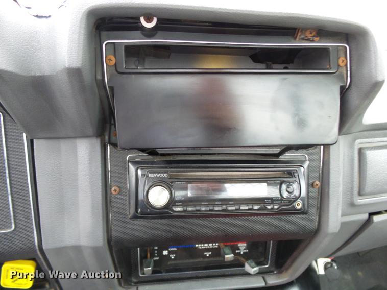 image for item DD2406 1990 Ford FT900 flatbed truck