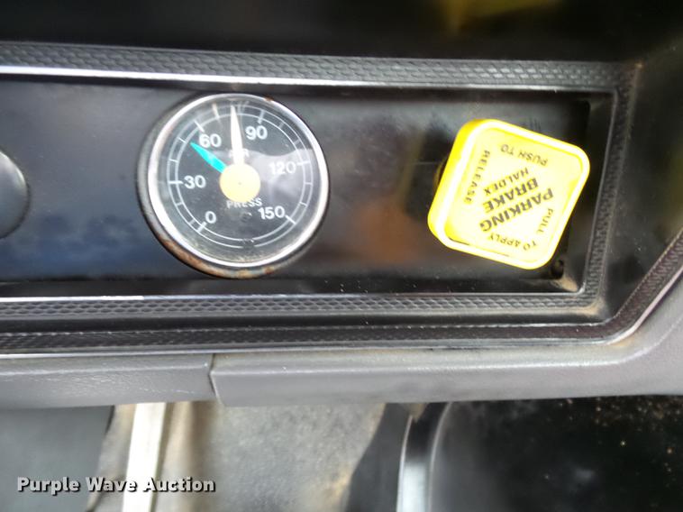 image for item DD2406 1990 Ford FT900 flatbed truck