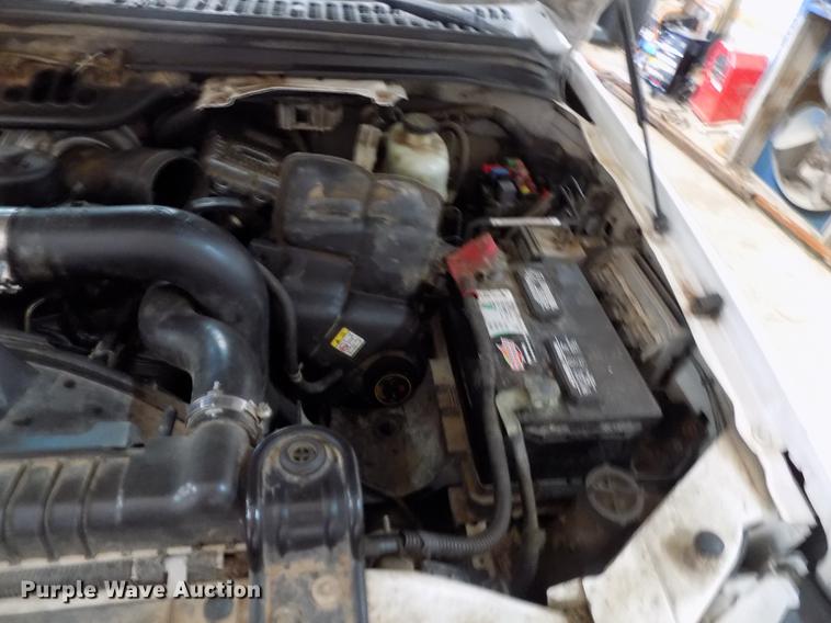 image for item DD3510 2005 Ford F450 Super Duty SuperCab flatbed truck