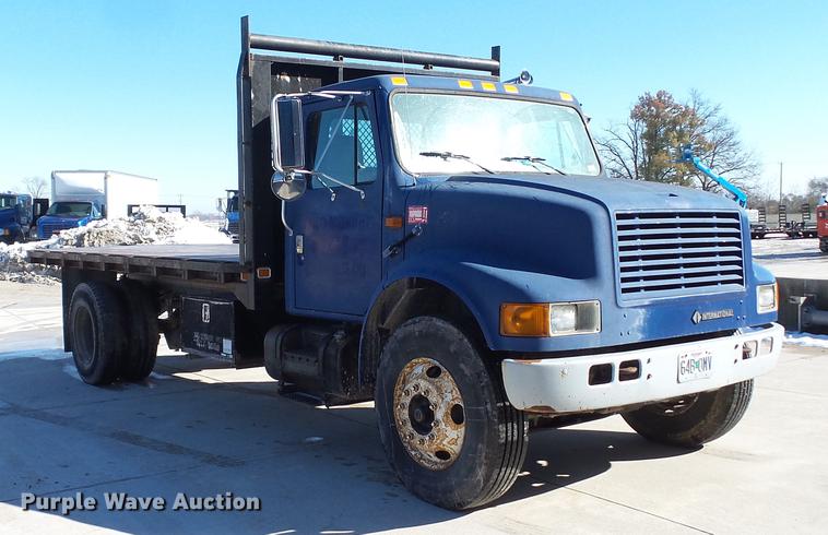 image for item DE4991 2000 International 4700 dump flatbed truck