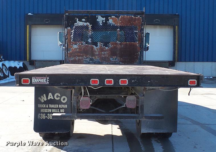 image for item DE4991 2000 International 4700 dump flatbed truck