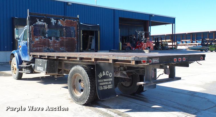 image for item DE4991 2000 International 4700 dump flatbed truck