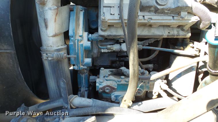 image for item DE4991 2000 International 4700 dump flatbed truck