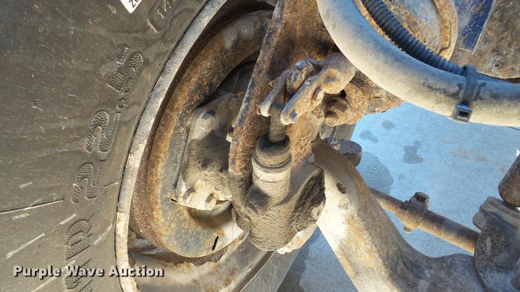 image for item DE4991 2000 International 4700 dump flatbed truck