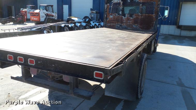 image for item DE4991 2000 International 4700 dump flatbed truck