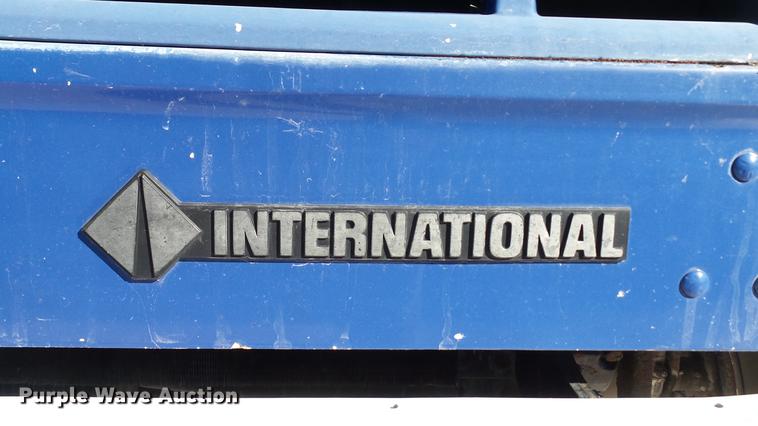 image for item DE4991 2000 International 4700 dump flatbed truck