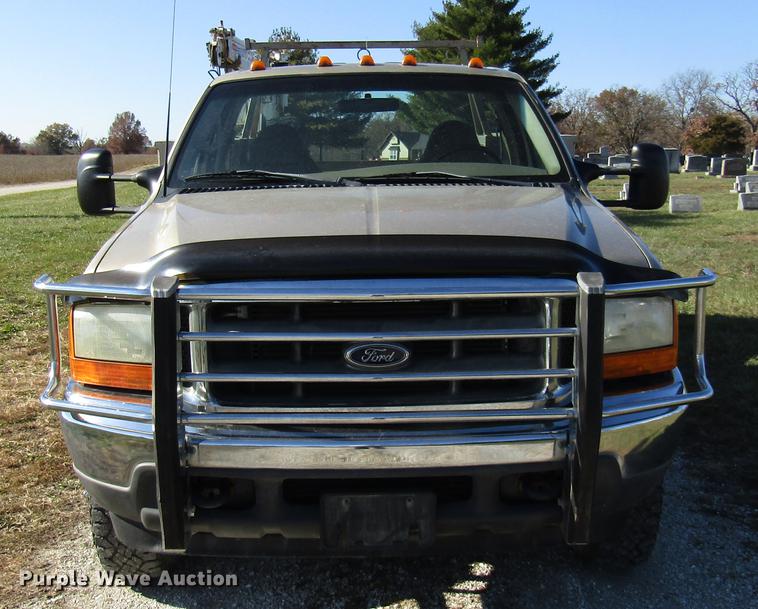 image for item DE5008 2001 Ford F350 Super Duty XLT utility bed truck with crane