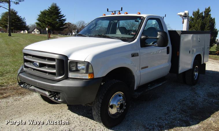 image for item DE5011 2004 Ford F350 Super Duty XL utility bed pickup truck with crane