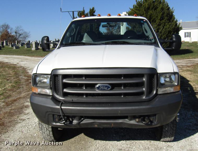 image for item DE5011 2004 Ford F350 Super Duty XL utility bed pickup truck with crane