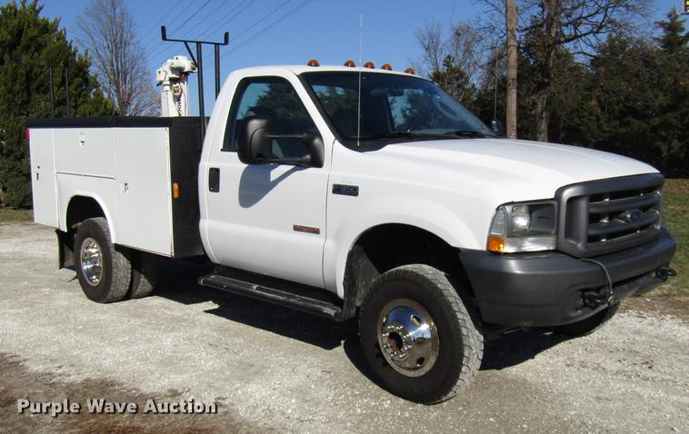 image for item DE5011 2004 Ford F350 Super Duty XL utility bed pickup truck with crane