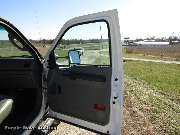 image for item DE5011 2004 Ford F350 Super Duty XL utility bed pickup truck with crane