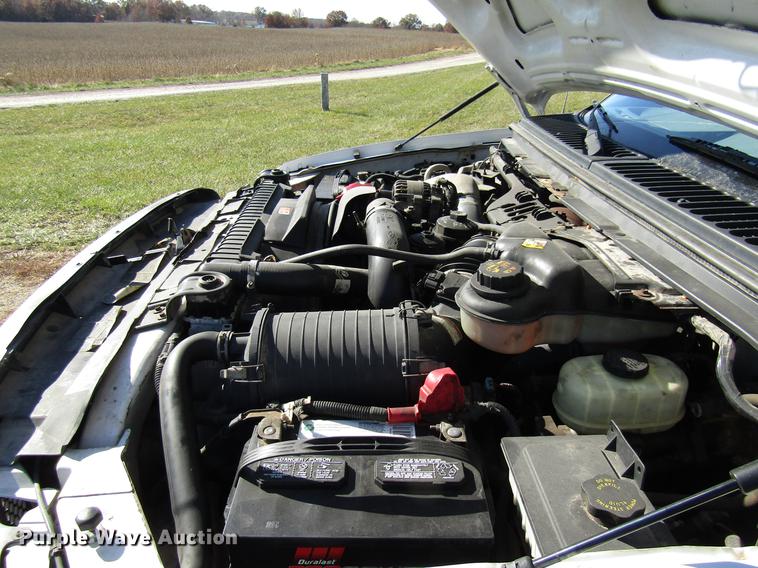 image for item DE5011 2004 Ford F350 Super Duty XL utility bed pickup truck with crane