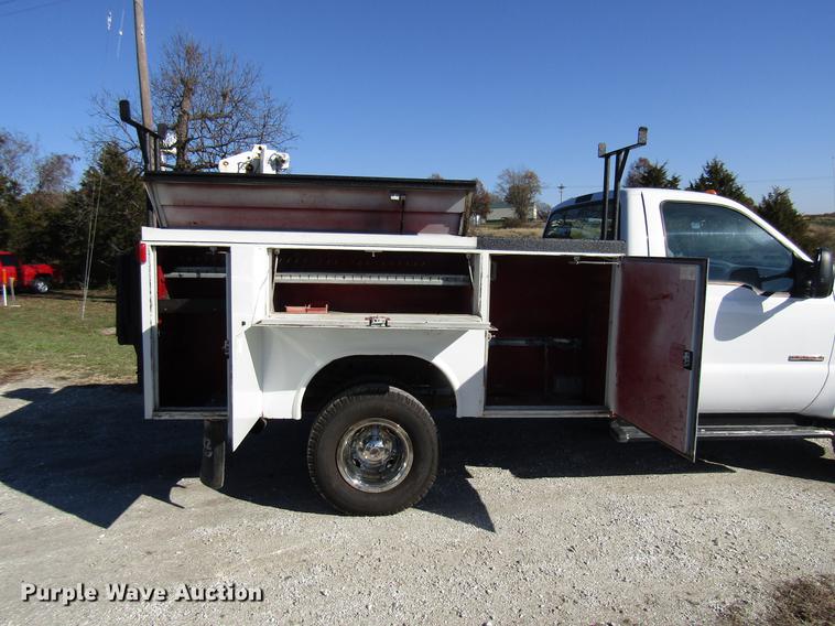 image for item DE5011 2004 Ford F350 Super Duty XL utility bed pickup truck with crane
