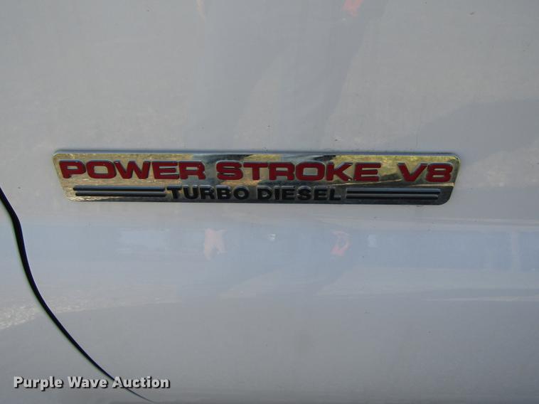 image for item DE5011 2004 Ford F350 Super Duty XL utility bed pickup truck with crane