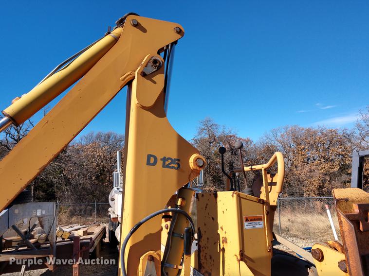 image for item DE6568 1999 Case 560 trencher