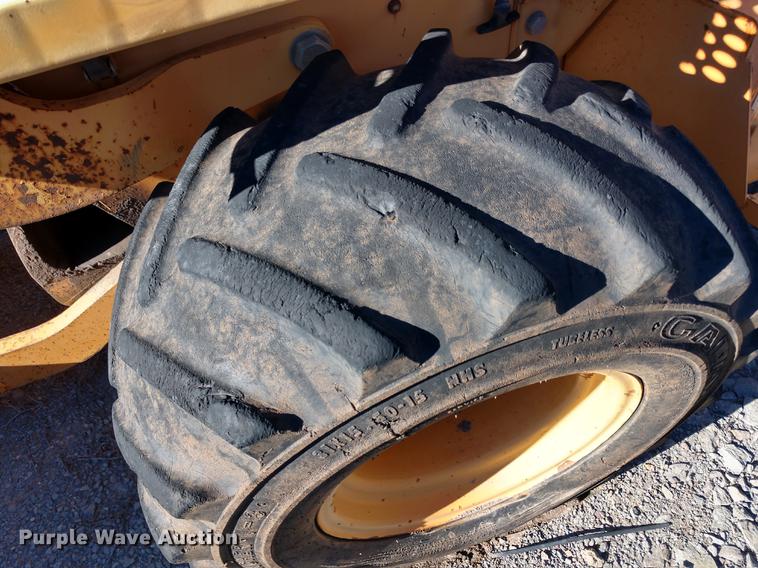 image for item DE6568 1999 Case 560 trencher