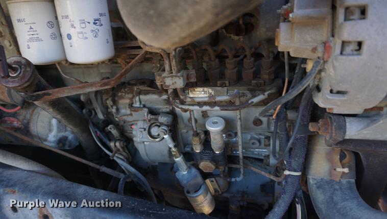 image for item DF1656 1990 Ford L7000 dump flatbed truck