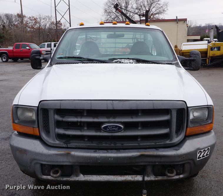 image for item DF1691 2000 Ford F350 Super Duty flat bed pickup truck