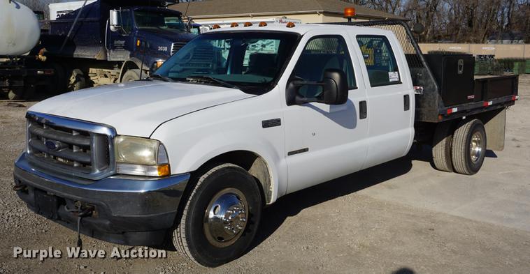 image for item DF1697 2002 Ford F350 Super Duty Crew Cab flat dump bed pickup truck