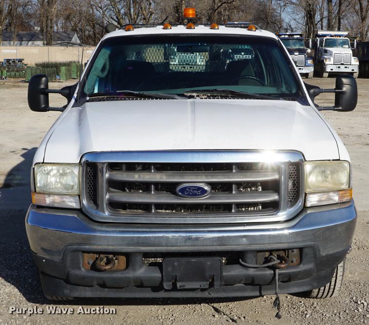 image for item DF1697 2002 Ford F350 Super Duty Crew Cab flat dump bed pickup truck