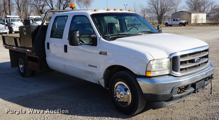 image for item DF1697 2002 Ford F350 Super Duty Crew Cab flat dump bed pickup truck