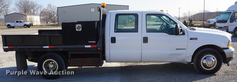 image for item DF1697 2002 Ford F350 Super Duty Crew Cab flat dump bed pickup truck