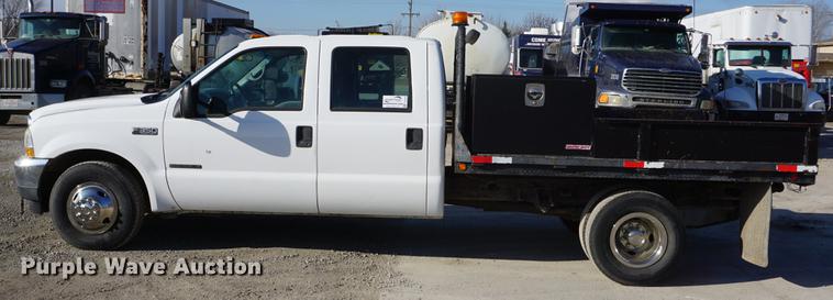 image for item DF1697 2002 Ford F350 Super Duty Crew Cab flat dump bed pickup truck