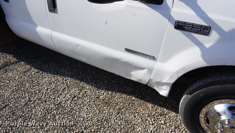 image for item DF1697 2002 Ford F350 Super Duty Crew Cab flat dump bed pickup truck