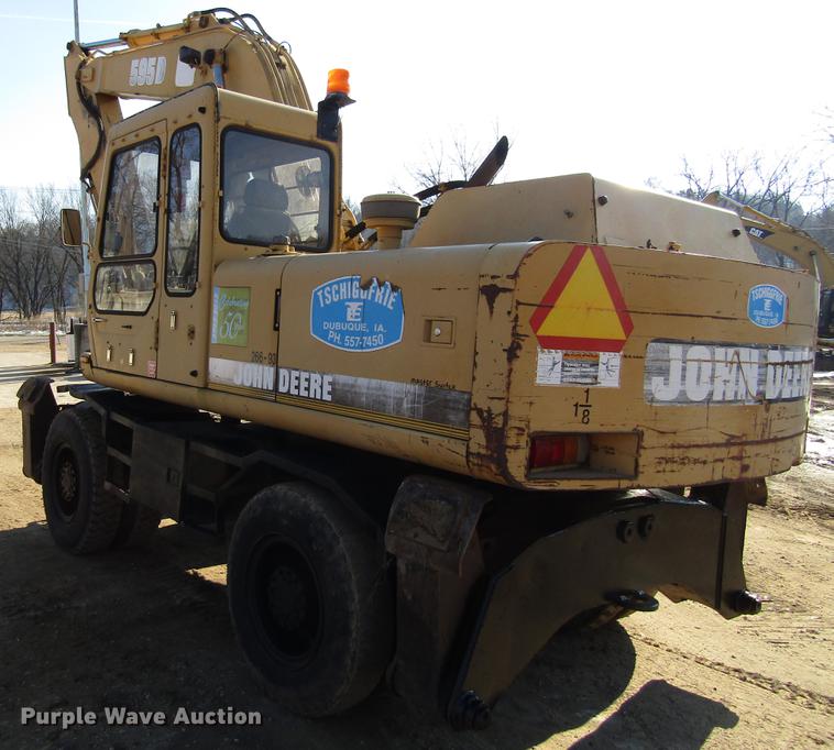 image for item DF3901 1993 John Deere 595D rubber tire excavator