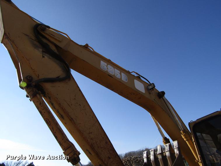 image for item DF3901 1993 John Deere 595D rubber tire excavator