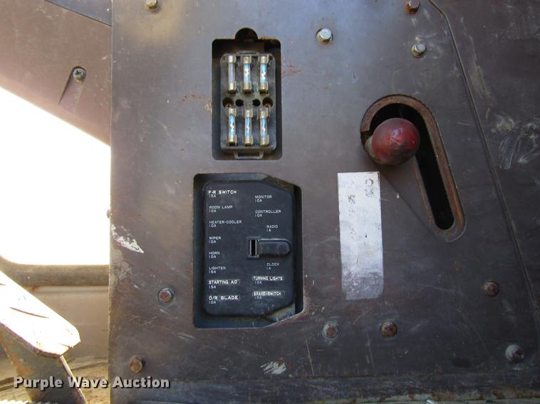 image for item DF3901 1993 John Deere 595D rubber tire excavator