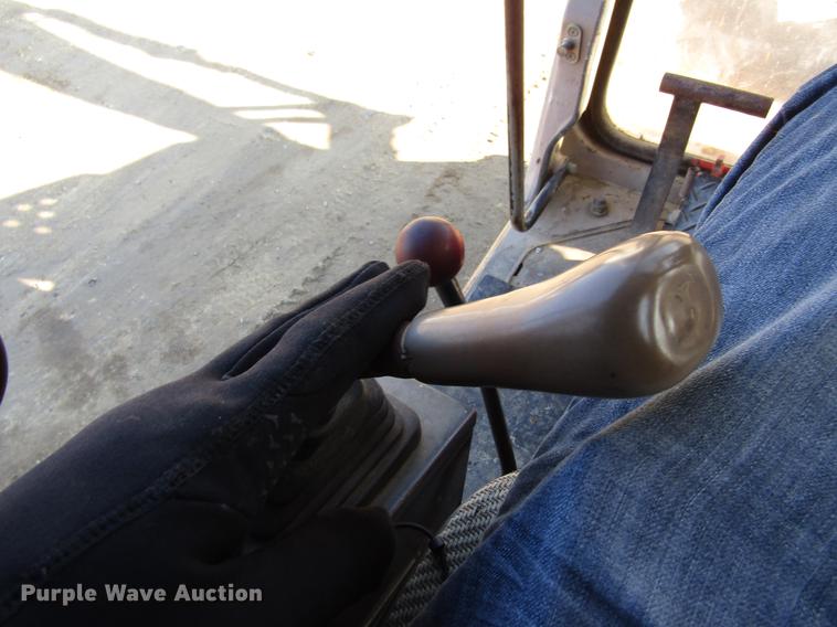 image for item DF3901 1993 John Deere 595D rubber tire excavator