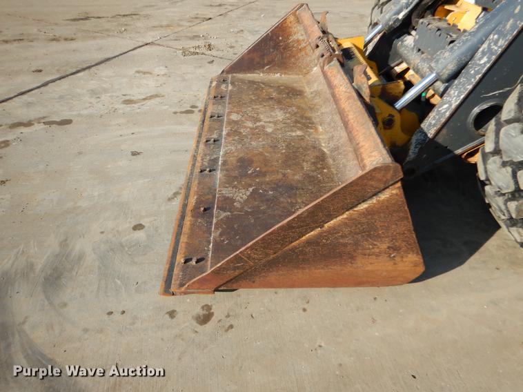 image for item DX9460 2014 John Deere 332E skid steer