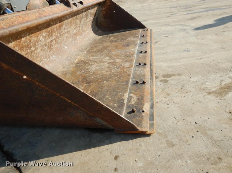 image for item DX9460 2014 John Deere 332E skid steer