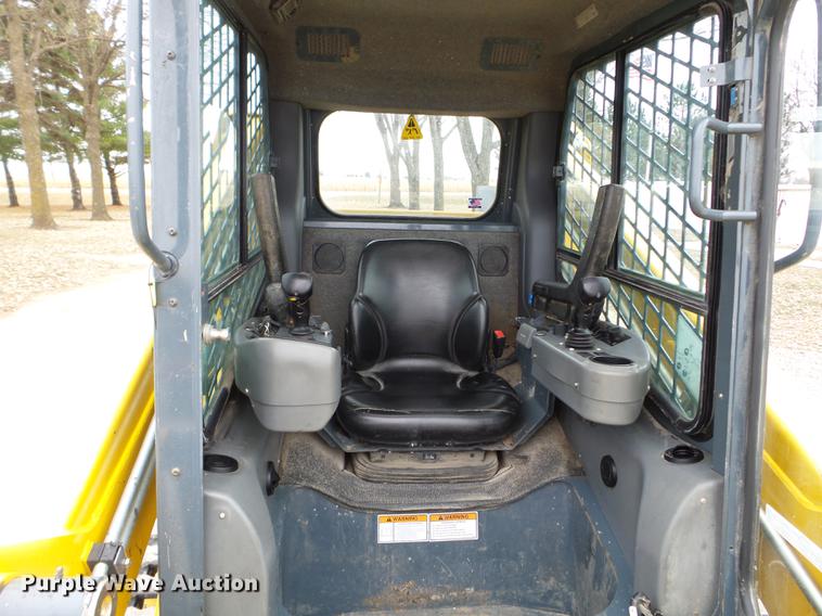 image for item DX9744 2015 Gehl RT210 skid steer