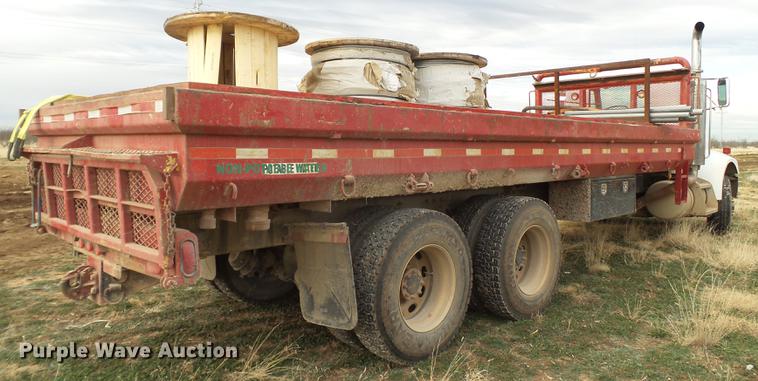 image for item EI9723 2002 Peterbilt 330 flatbed water truck