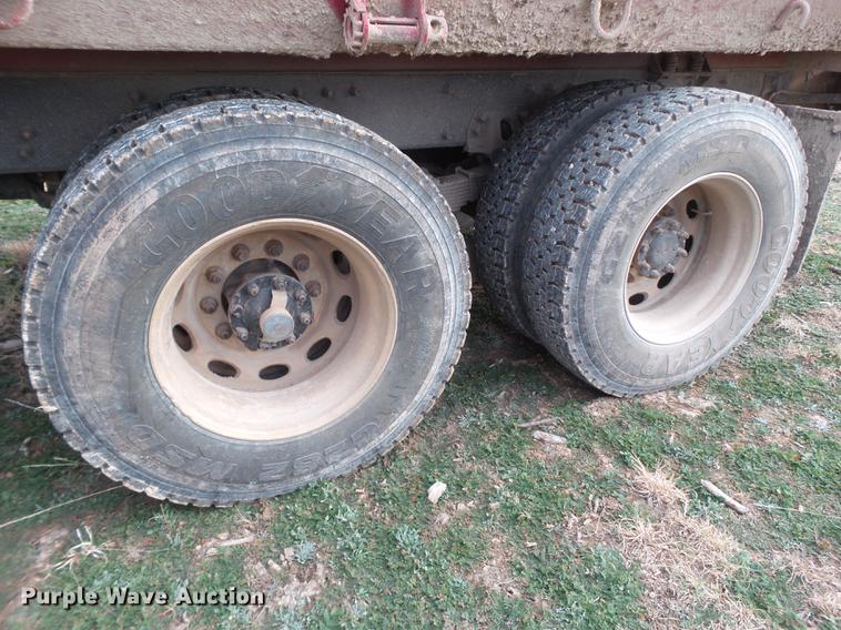 image for item EI9723 2002 Peterbilt 330 flatbed water truck