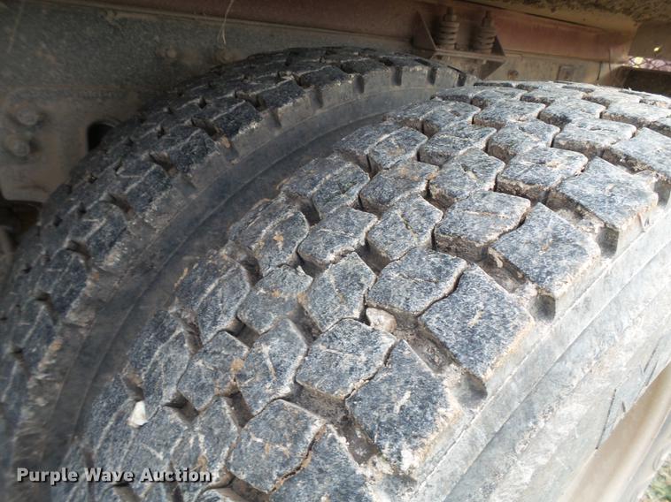 image for item EI9723 2002 Peterbilt 330 flatbed water truck