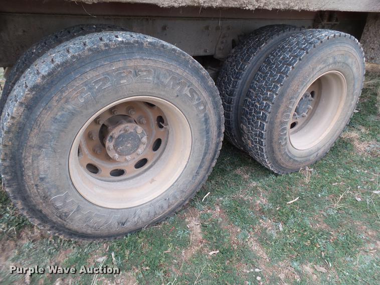 image for item EI9723 2002 Peterbilt 330 flatbed water truck