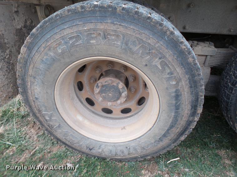 image for item EI9723 2002 Peterbilt 330 flatbed water truck