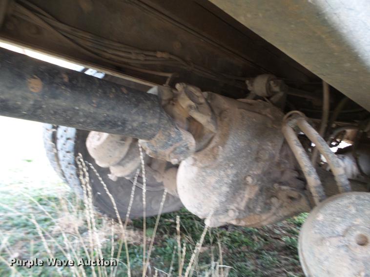 image for item EI9723 2002 Peterbilt 330 flatbed water truck